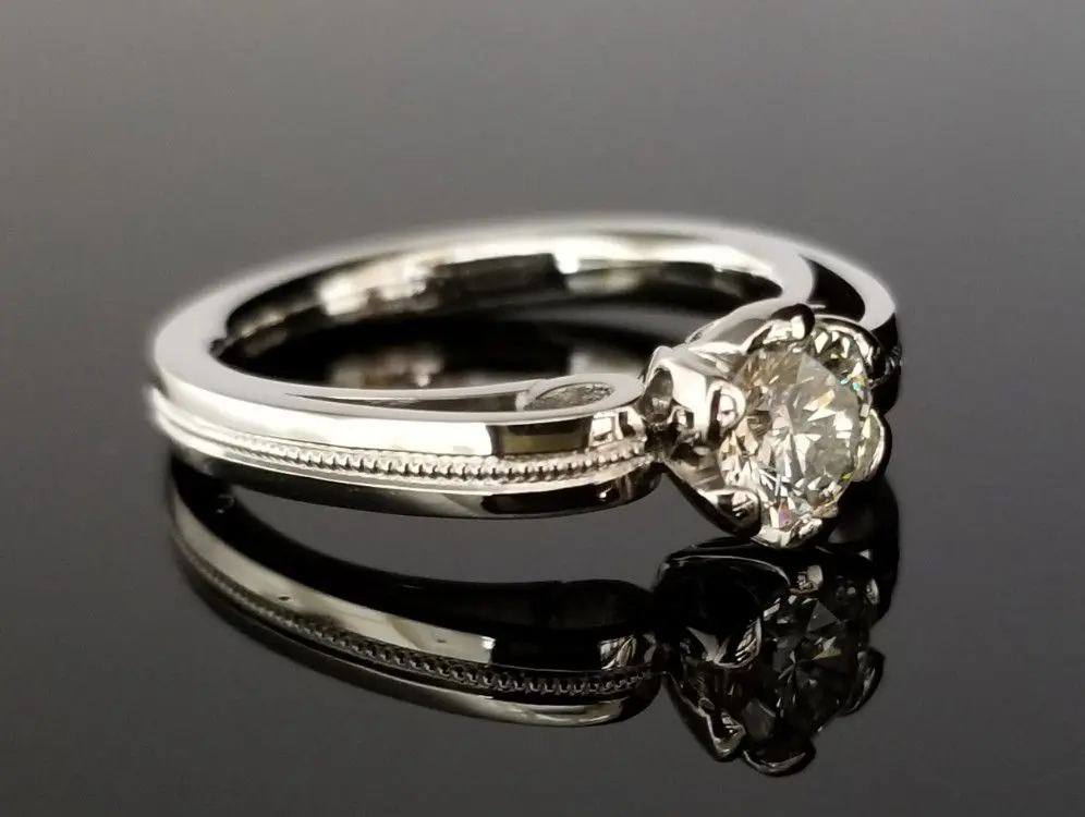 エレガントな婚約指輪 | 結婚・婚約指輪のオーダーメイドは鍛造指輪
